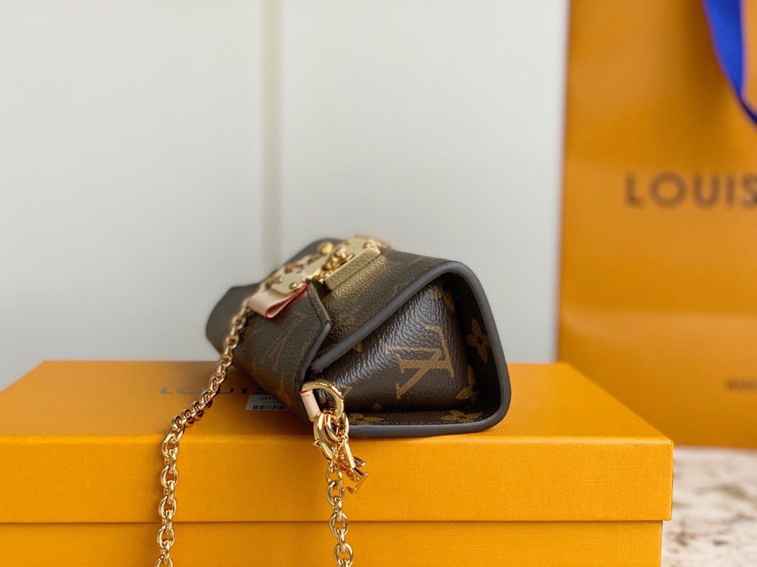 LV Bitsy Pouch leather mini Bag