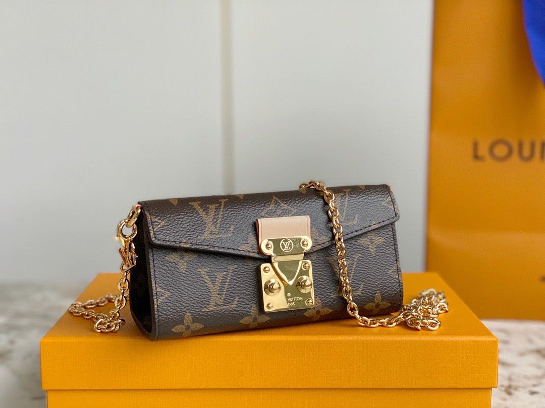 LV Bitsy Pouch leather mini Bag