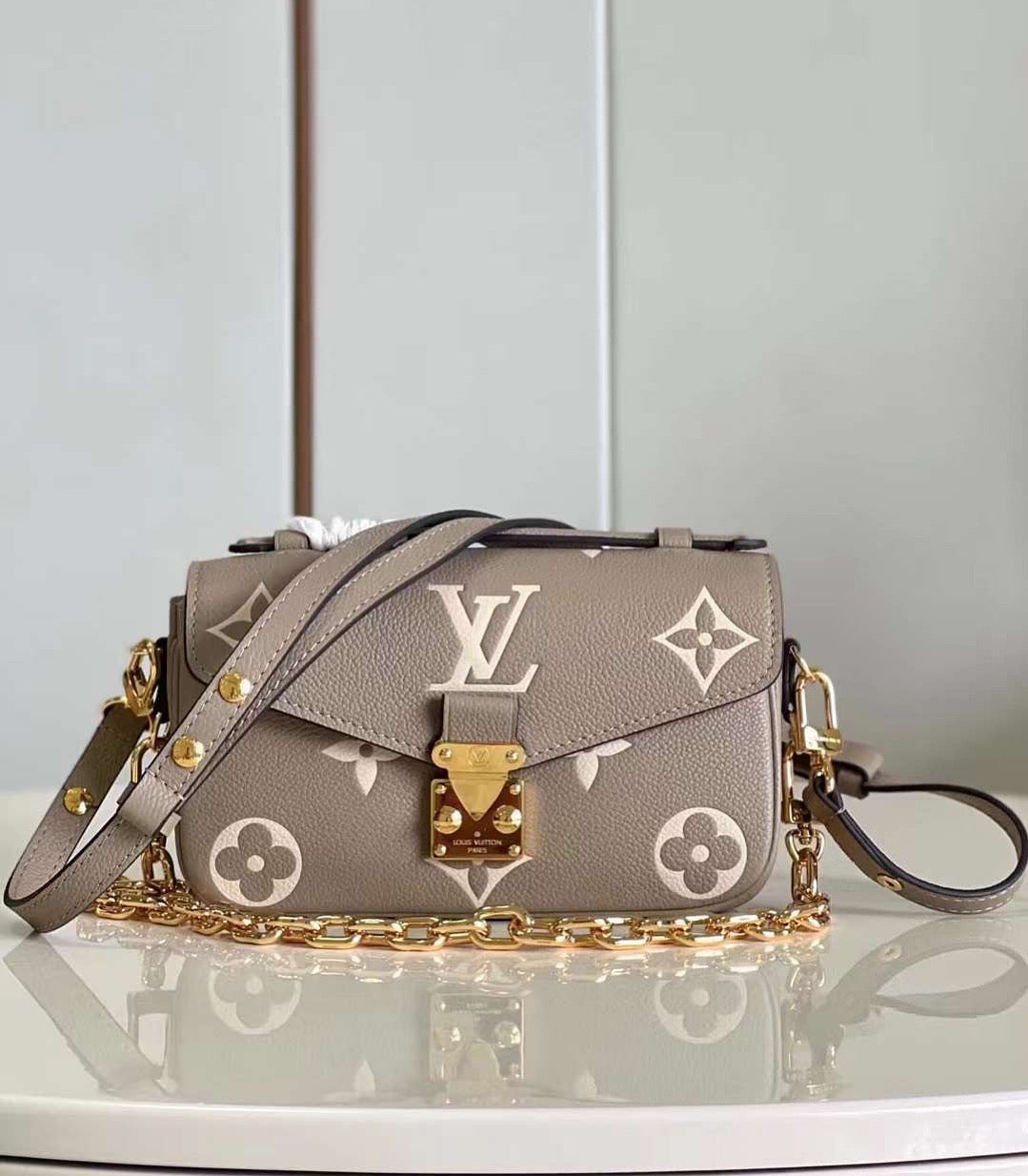 LV pochette with brand box