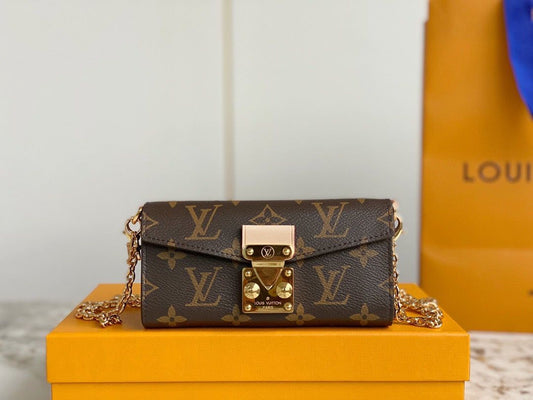 LV Bitsy Pouch leather mini Bag