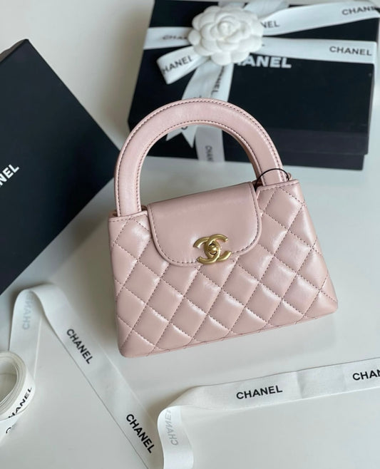 CHANEL Kelly mini handbag with brand box